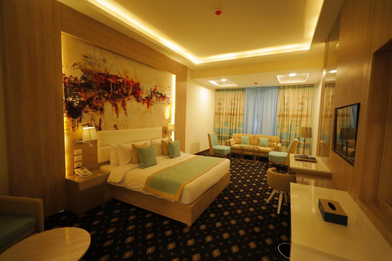 קהיר Tolip Gardens Hotel מראה חיצוני תמונה A room at the hotel