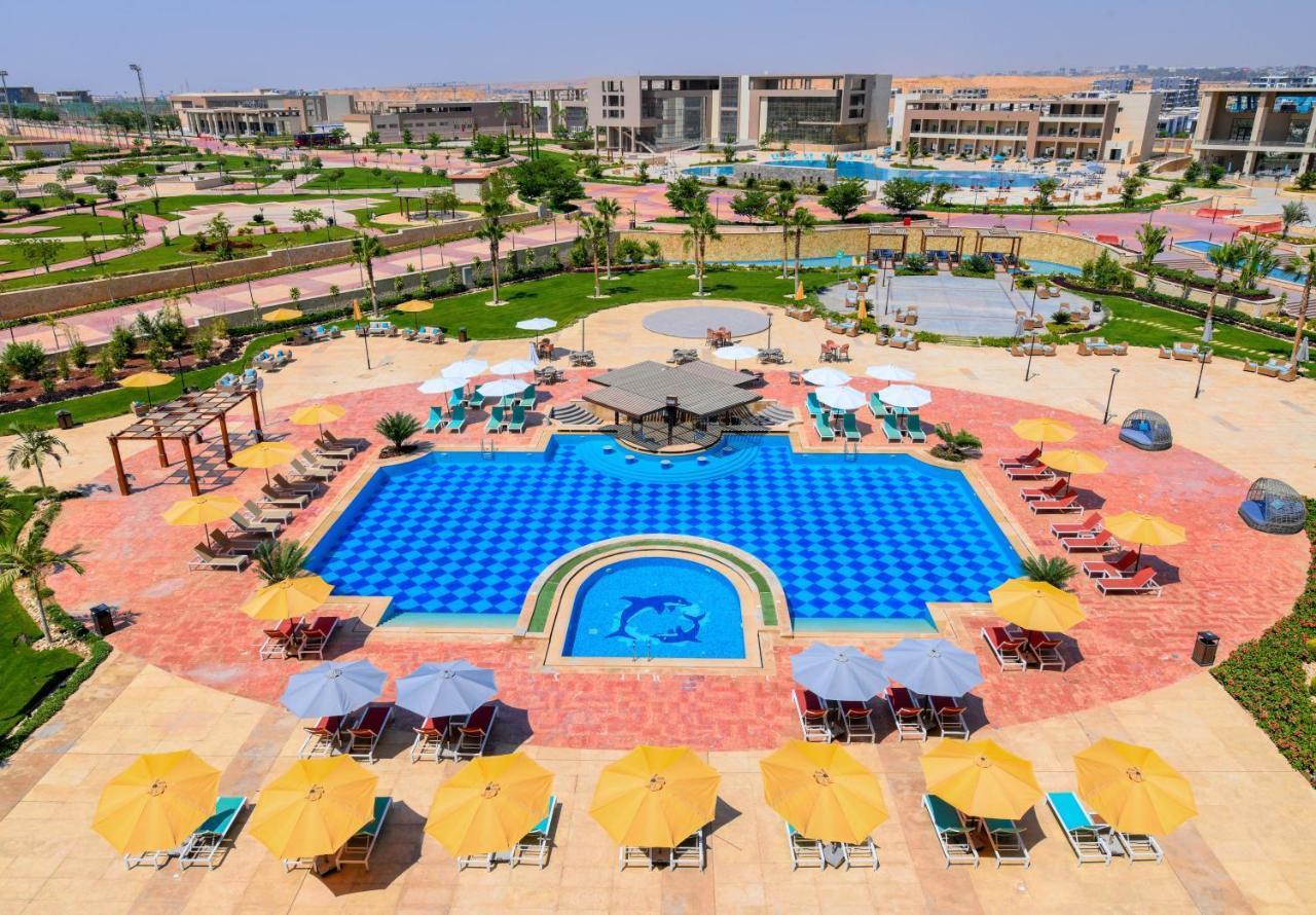 קהיר Tolip Gardens Hotel מראה חיצוני תמונה The swimming pool at the resort